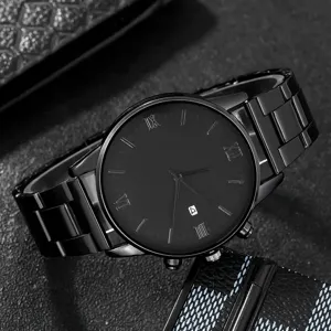 Macro detail of a sleek black men's business watch with a metal strap and calendar display