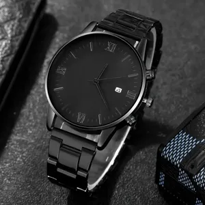 Close-up detail of an all-black business watch featuring Roman numerals and date window