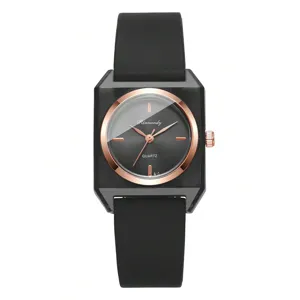 Detailansicht einer minimalistischen Damenquarzuhr mit schwarzem Silikonarmband und Goldlünette
