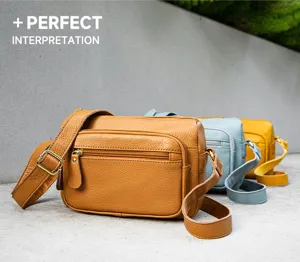 Genuine leather women's crossbody shoulder bag with multi-pocket and multi-compartment design.