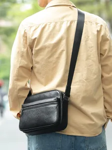 Bolso bandolera de cuero negro hombre elegante bolso informal con correa ancha uso diario.