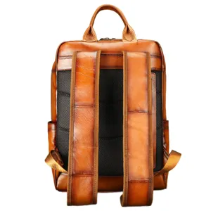 Vintage genuine leather backpack for men, casual business laptop bookbag with breathable straps.