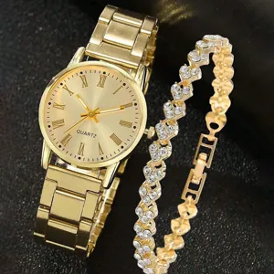 Elegante goldfarbene Damenquarzuhr im Set mit einem funkelnden Strass-Herzarmband-Set.