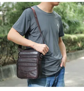 Men's leather vertical crossbody bag showcase, multi-pocket casual business shoulder bag.