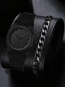 Close-up of minimalist black men's quartz watch and cuban link bracelet set