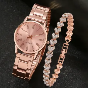 Detailansicht einer roségoldenen Damenquarzuhr mit einem herzförmigen Diamantarmband