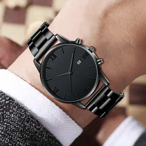 Detailed close-up of a minimalist black men's business watch with Roman numerals on a wrist.