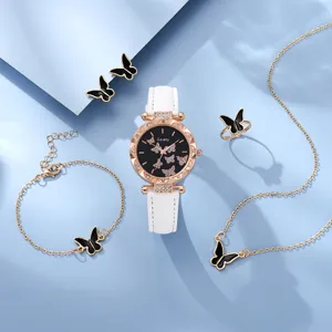 Detailansicht des 5-teiligen Schmetterlings-Schmucksets mit weißer Lederarmbanduhr