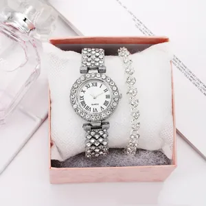 Elegant silver women's quartz watch and heart bracelet gift set in a pink jewelry box