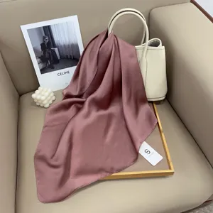 Solid color silk square scarf for women, elegant minimalist fashion accessory for daily wear.