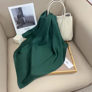 Solid dark green silk square scarf for women, elegant small neckerchief for professional and daily wear.