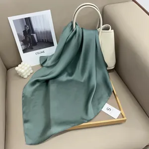 Green solid silk square scarf for women, elegant satin neck scarf for professional use.
