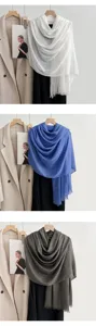 Solid color linen cotton scarf detail showing soft gauze texture, elegant drape and fringe.