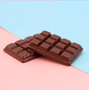 Vista dettagliata di accessori barretta di cioccolato in resina per decorazioni