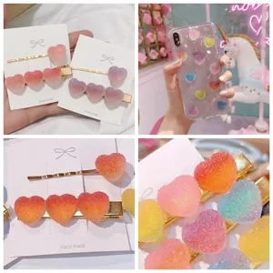 Detailansicht bunter Gummibärchen-Herz-Harz-Accessoires für Haare und DIY-Handwerk.