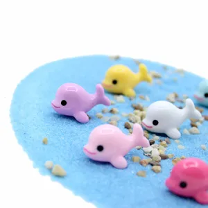 Detailed view of colorful mini resin dolphin figurines for DIY micro landscape crafts