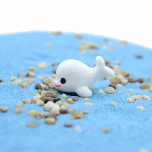Detail of a white resin miniature dolphin figurine for ocean themed DIY micro-landscapes