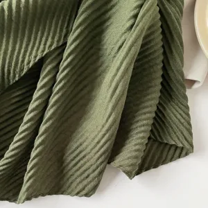 Elegant olive green pleated scarf featuring a sophisticated fine ribbed fabric texture