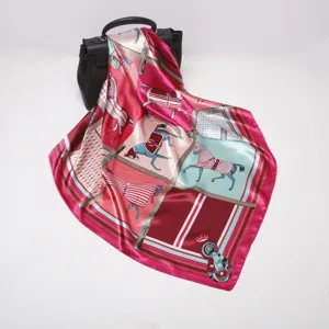 Close-up detail of luxury satin silk horse harness print square scarf elegant accessory