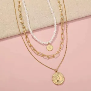 Multi-layer layered pearl gold chain necklace with vintage coin pendant for women daily wear.