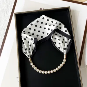Chic black and white polka dot silk scarf with elegant faux pearl magnetic clasp necklace.
