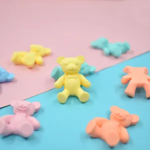 Detailed view of colorful matte resin bear accessories for DIY phone cases