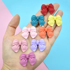 Bunte matte Harz-Schleifen-Accessoires für DIY-Handyhüllen und süßen Haarschmuck.