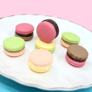 Detailed macro shot of colorful 3D resin macaron accessories for DIY crafts