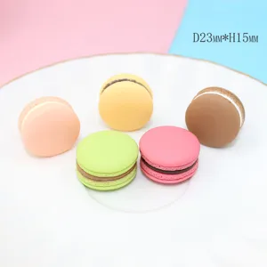 Detailed macro view of colorful resin macaron accessories with dimensions marked