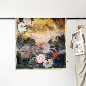 Detailed view of the 90cm satin square silk scarf featuring an elegant floral landscape print.