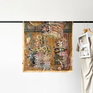Detail shot of vintage mural print satin square scarf hanging on display against white wall.