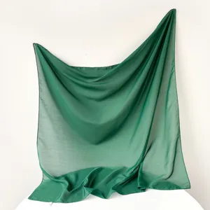 Elegant solid color Turkish gauze square scarf, lightweight hijab and stylish shawl drape.