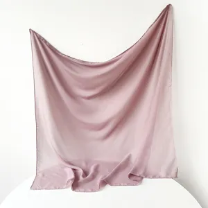 Detail view of the solid color Turkish yarn square scarf, showing soft texture and drape.