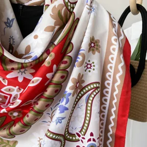 Detailed view of the ethnic style paisley print scarf, highlighting soft texture and vibrant colors.