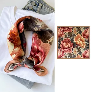 Detailed view of a vintage floral silk square scarf, elegant retro pattern for women styling.