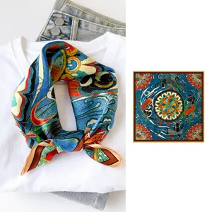 Exquisite Chinese style printed silk square scarf with vibrant artistic patterns and smooth texture.