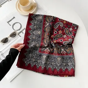 Angora red paisley print silk scarf, elegant retro design for women's autumn style.