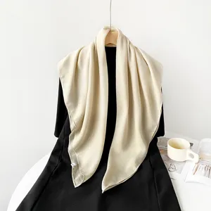 Solid color cotton linen square scarf for women, versatile hijab and neckerchief detail view.