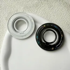 Close-up of 360-degree rotating magnetic phone ring stands with colorful shell inlay