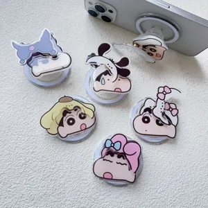 Gros plan de supports de téléphone magnétiques en acrylique aux motifs de dessins animés