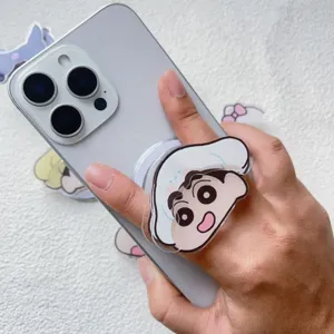 Détail du support de téléphone magnétique en acrylique avec le personnage Shin-chan.