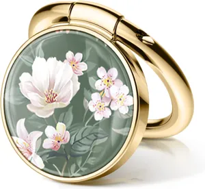 Close-up view of a luxury gold phone ring holder featuring a delicate floral print design