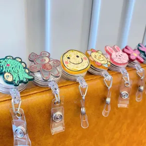 Retractable badge reels with cute doodle cartoon designs for nurse and doctor ID cards