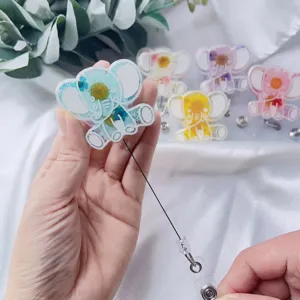 Portabadge a forma di elefante retrattile con veri fiori secchi in resina lucida