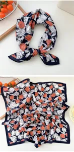 Detailed close-up of navy blue floral print cotton linen square scarf showing elegant fabric texture.