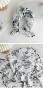 Close-up detail of the black and white landscape print cotton linen square scarf texture.
