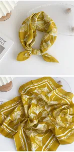 Detailed view of yellow cotton linen small square scarf featuring white ginkgo leaf botanical print.
