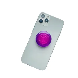 Supporto per telefono pieghevole viola traslucido su uno smartphone grigio chiaro