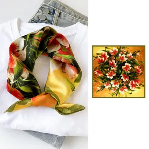 Silk small square scarf detail view, featuring vibrant floral print and elegant color combination.