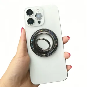Detail of 360-degree rotating magnetic phone ring holder with shell pattern resin